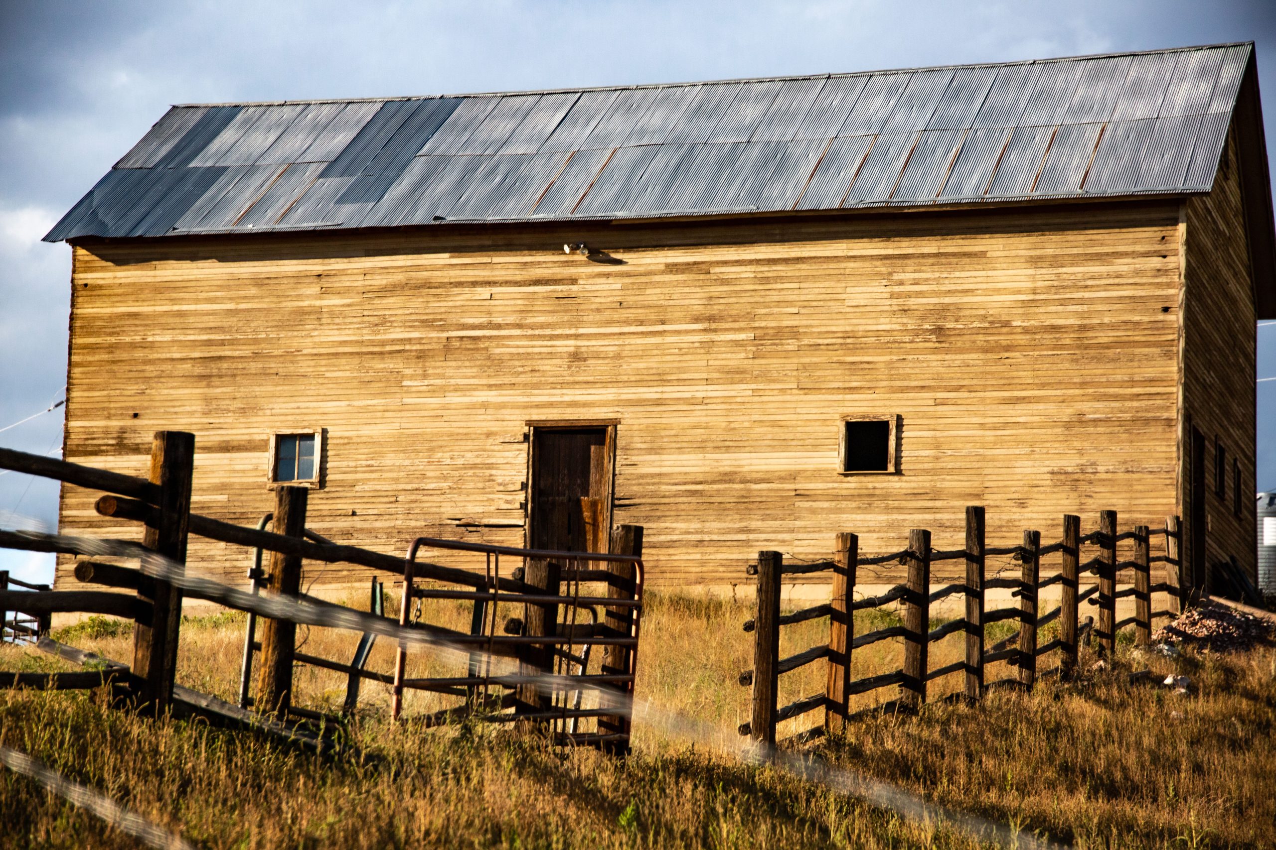 Image 1: Historic horse barn at red mountain open space.