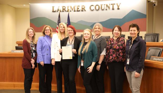 From left: Regional Ombudsman Program Supervisor Amber Franzel, County Commissioner Jody Shadduck-McNally, County Manager Lorenda Volker, Ombudsman Kate Poppenhagen, Ombudsman Kara Marang, Office on Aging Program Manager Erin Alt, County Commissioner Kristin Stephens, and Human Services Deputy Division Manager Katie Stieber celebrate the proclamation of October as Residents' Rights Month