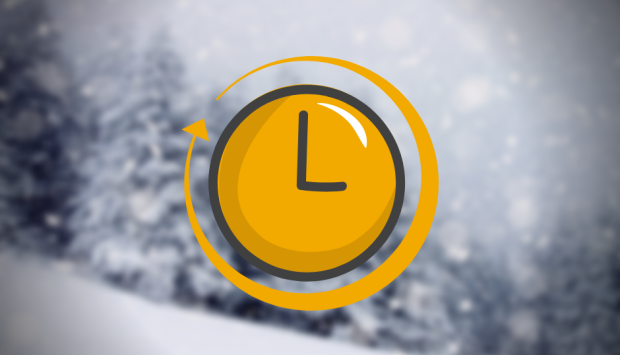 Uhr mit schneebedecktem Hintergrund