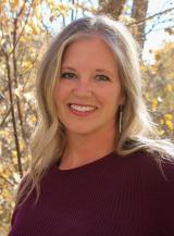 Larimer County Behavioral Health Services Director Amy Martonis smiles for a photo