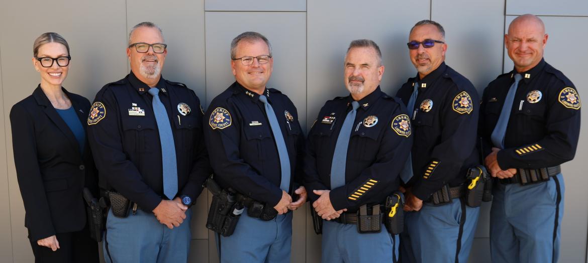 Image of Larimer County Sheriff John Feyen and the 5 members of LCSO command staff