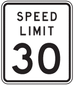 A 30 mph speed limit sign featuring a white background and bold black text displaying "Speed Limit 30".