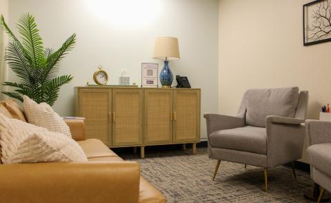 The calming room for clients at Crossroads Safehouse & Services is bathed in warm light.