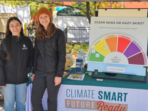 two people by air quality game at event