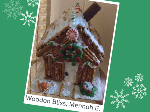 Gingerbread House Decorating Contest A gingerbread house made to look like a log cabin. Text reads, "Wooden Bliss, Mennah E."