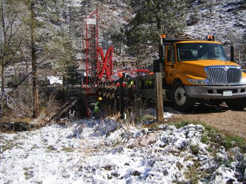 Inspection platform to access the sides and underneath of the bridge from the roadway.