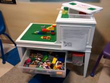 DIY Lego table. Used liquid nails to glue Lego base to old end table that  we spray painted. Made a road around the bo…