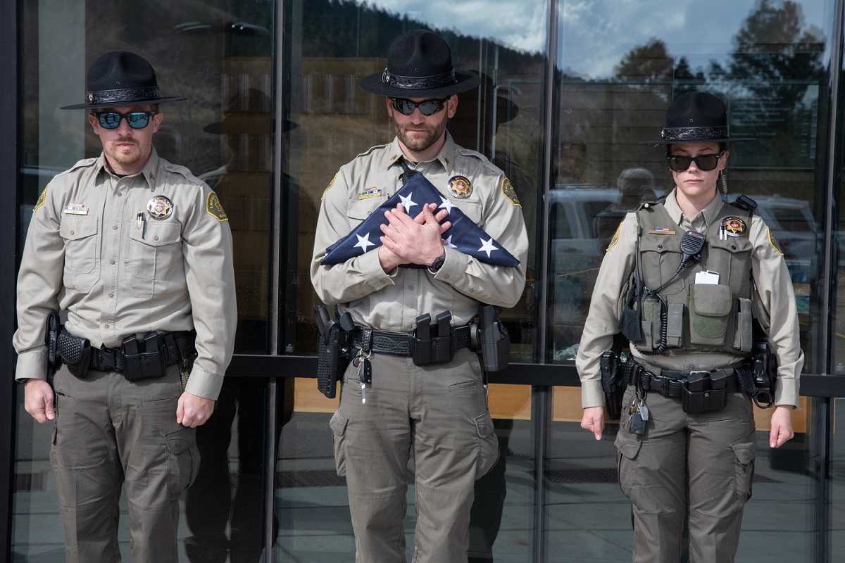 Image 4: Larimer County Rangers stand at attention for flag raising ceremony, courtesy Charlie Johnson