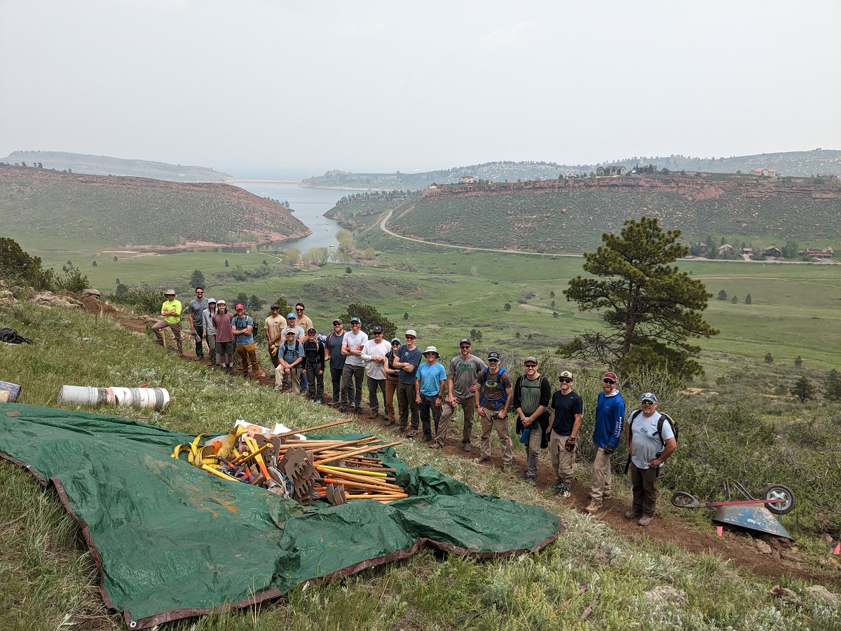 Image 3: Volunteers group together during a recent trail building day at Horsetooth Mountain Open Space.